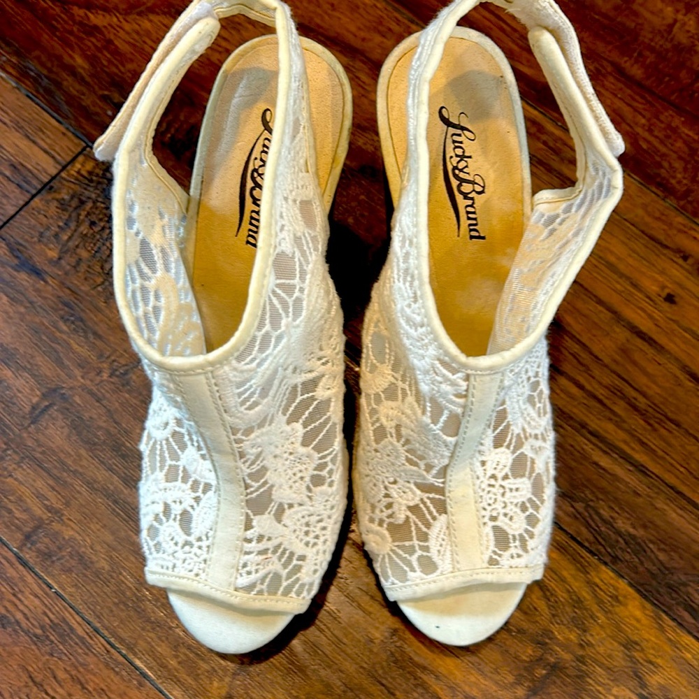 Lucky Brand wood wedge heels 4inch. Great condition worn once.